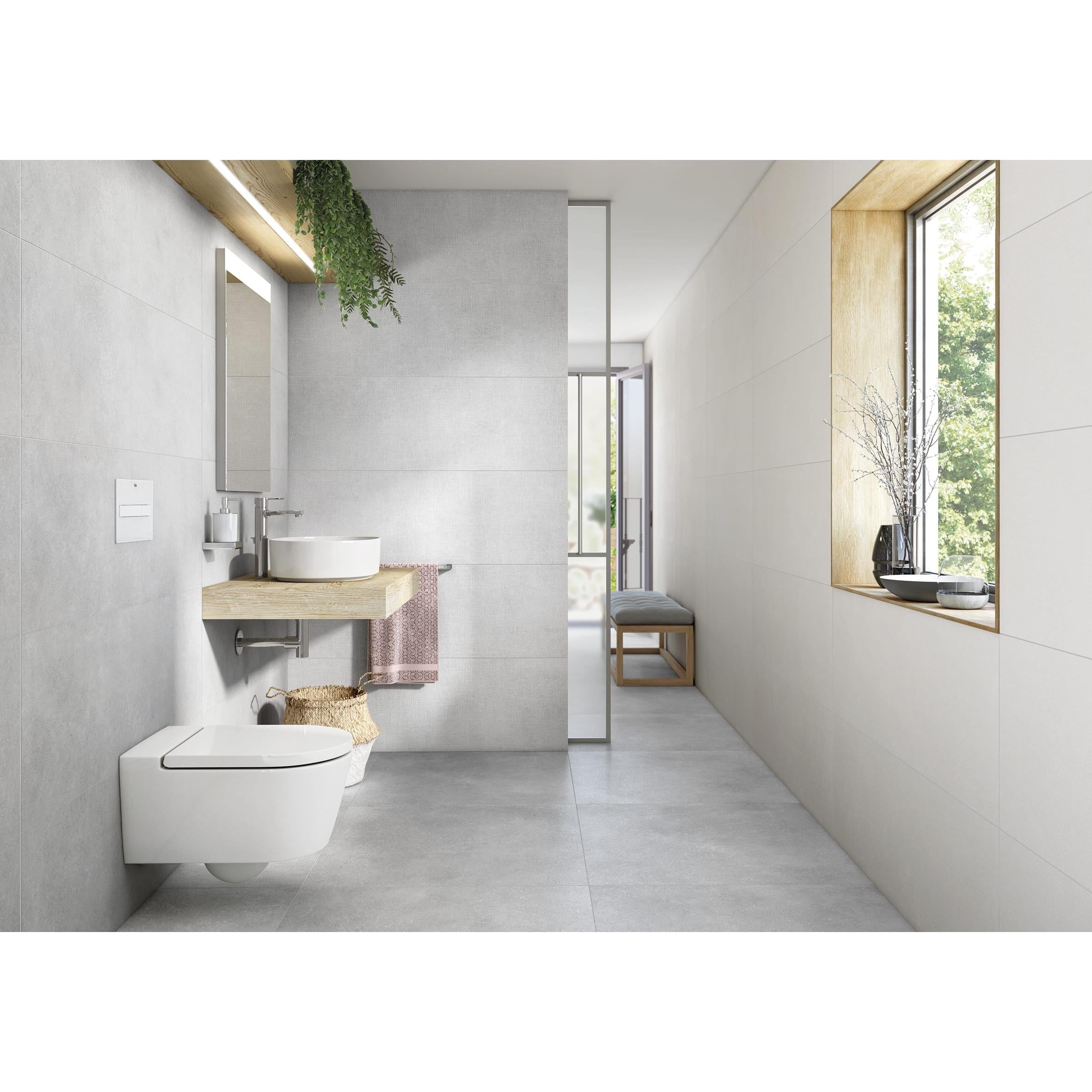 Roca - Inodoro completo suspendido Round inspira Rimless® con salida horizontal