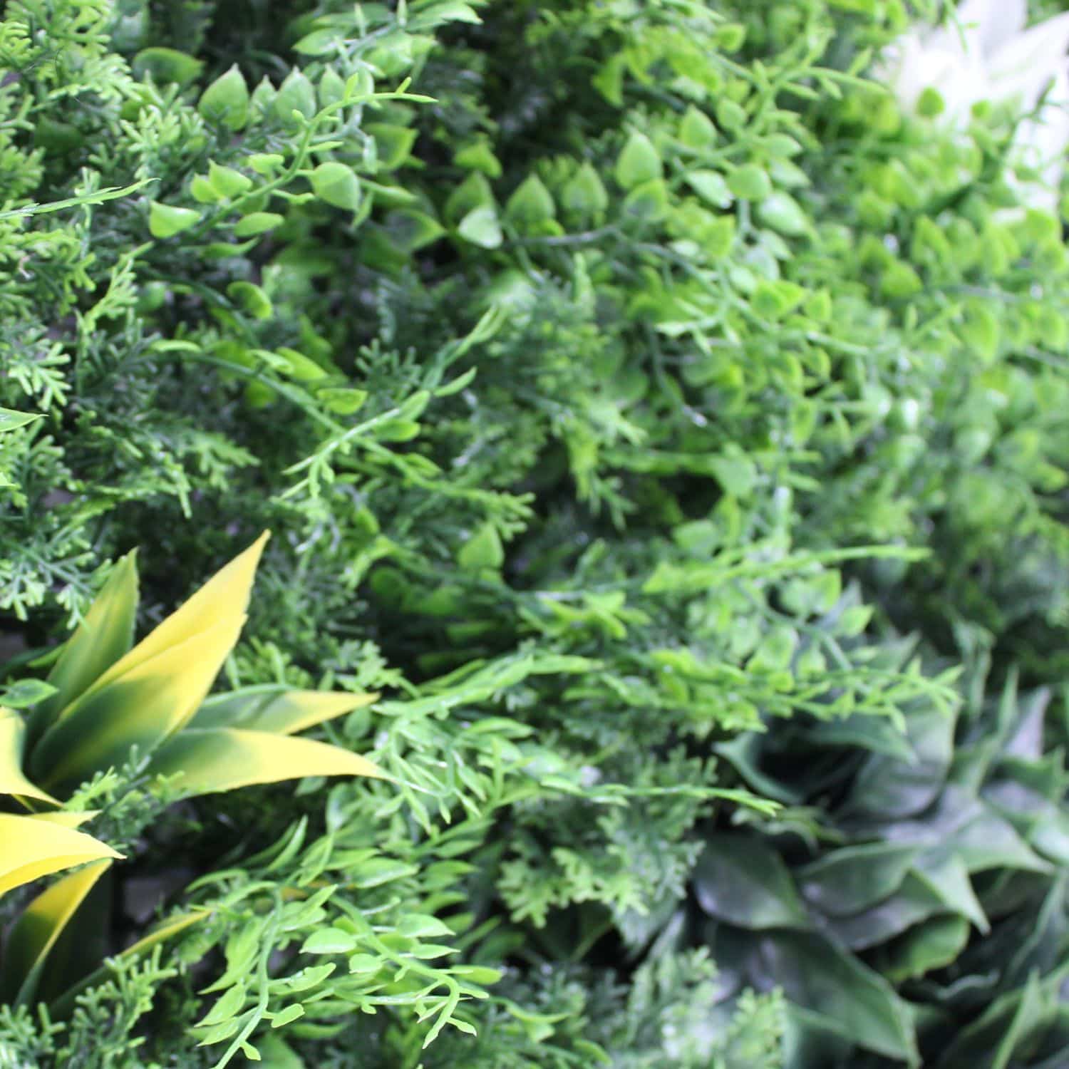https://www.unicesped.com/wp-content/uploads/2025/12/Jardin-Vertical-Artificial-Secret-Garden-detalle.jpg