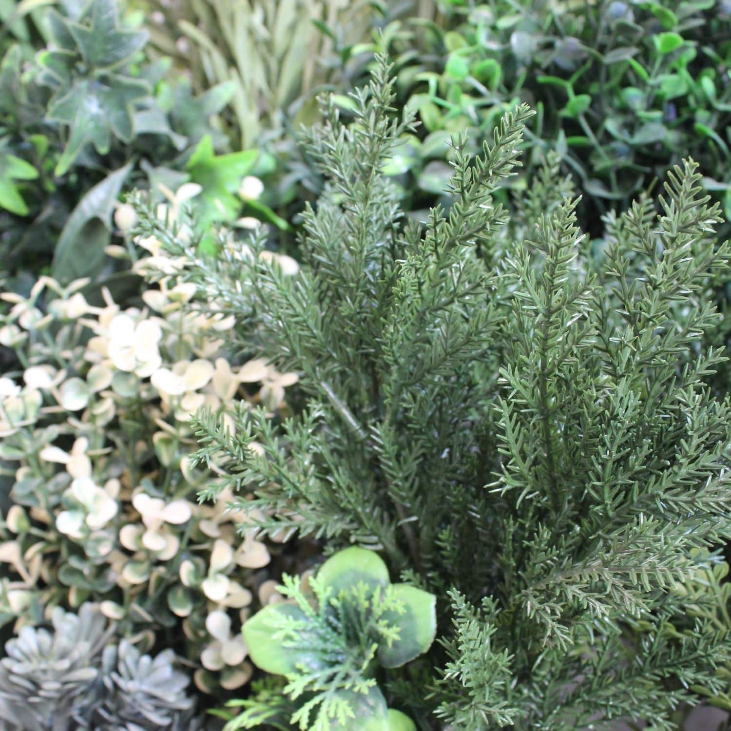 https://www.unicesped.com/wp-content/uploads/2025/12/Jardin-vertical-artificial-Green-Winter-detalle.jpg