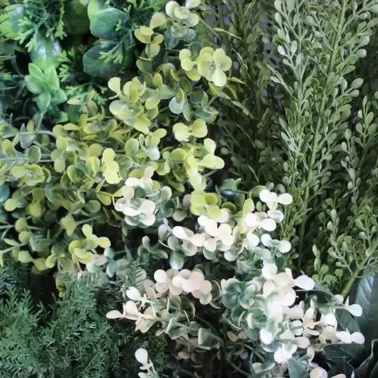 https://www.unicesped.com/wp-content/uploads/2025/12/Jardin-vertical-artificial-premium-White-winter-detalles-768x768.jpg.webp