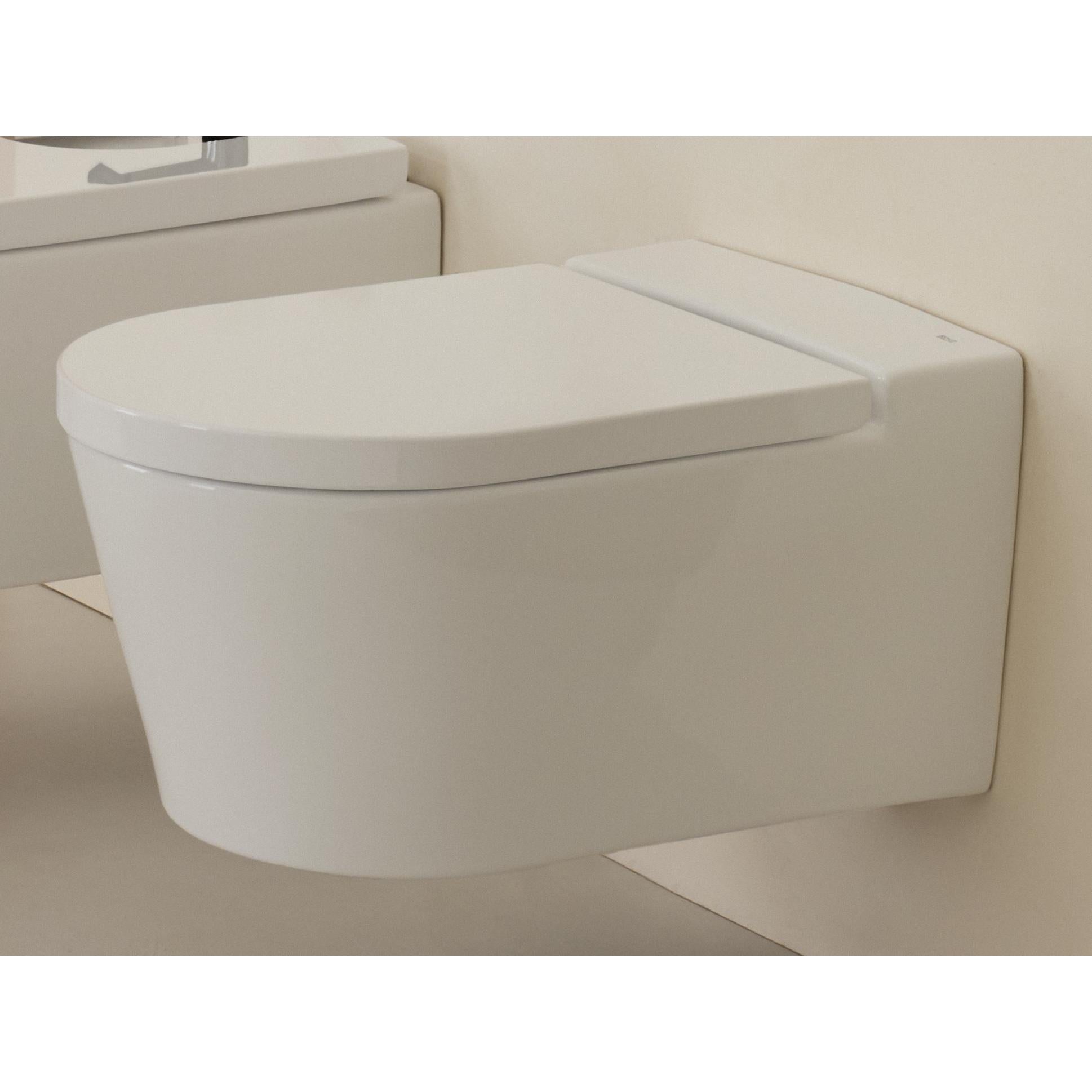 Roca -  Inodoro completo suspendido compacto inspira round Rimless® con salida horizontal